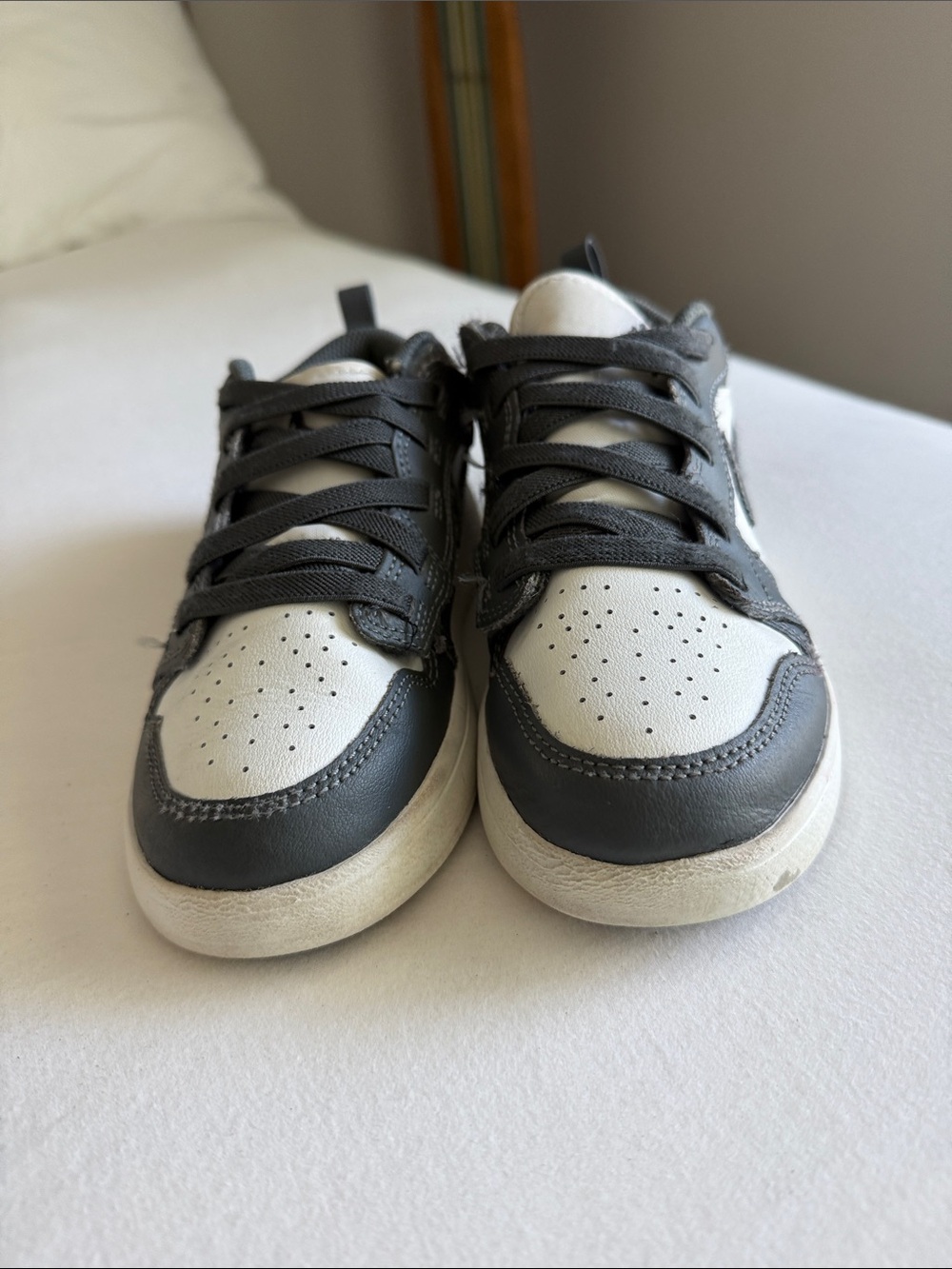 Nike Air Jordan 1 Kids Low-Top Sneakers in White and Charcoal